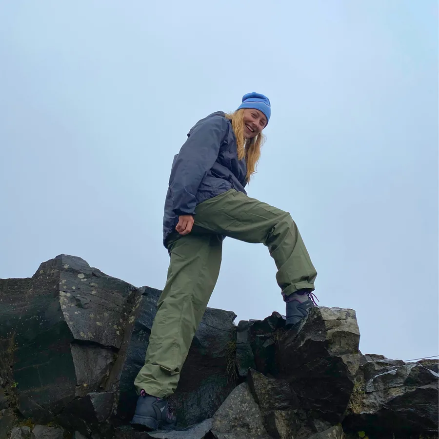Alicia climbing a mountain